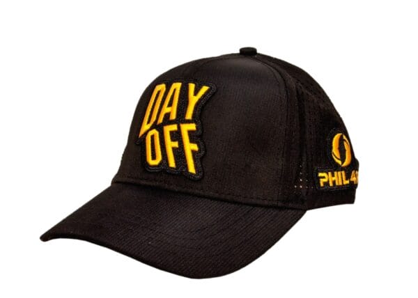 Black cap with "DAY OFF" embroidered in yellow and black.