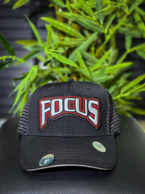 Black cap with "FOCUS" embroidered in red, white, and blue.